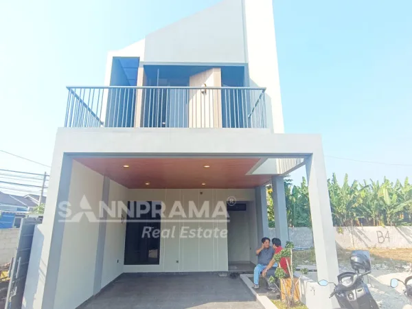 Tampak depan rumah baru desain modern di Cluster Limo Depok dekat tol